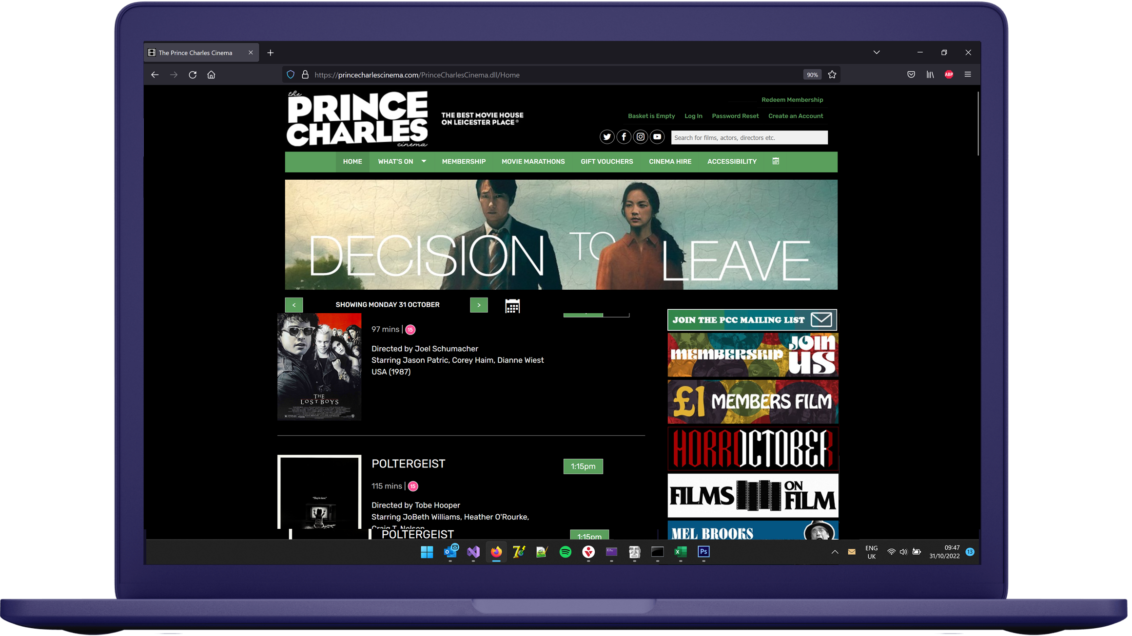 A cinema website displayed on a laptop computer